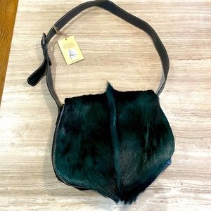 Absolutely GORGEOUS Patricia Nash purse. Dark turquoise fur with black leather.